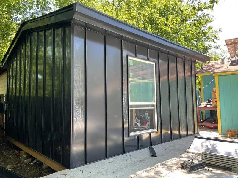 Black standing seam metal wall panels for Roof Inspection in Voorhees